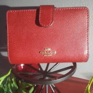 Coach red leather medium corner zip wallet